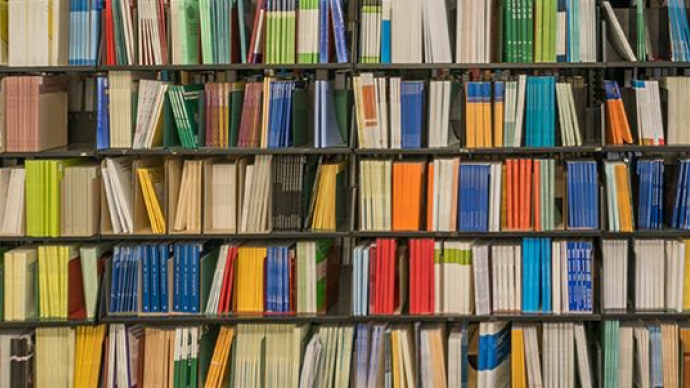 shelf of colorful books