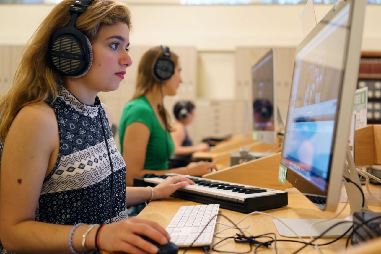 A student works in the Media Lab in Lamont Library