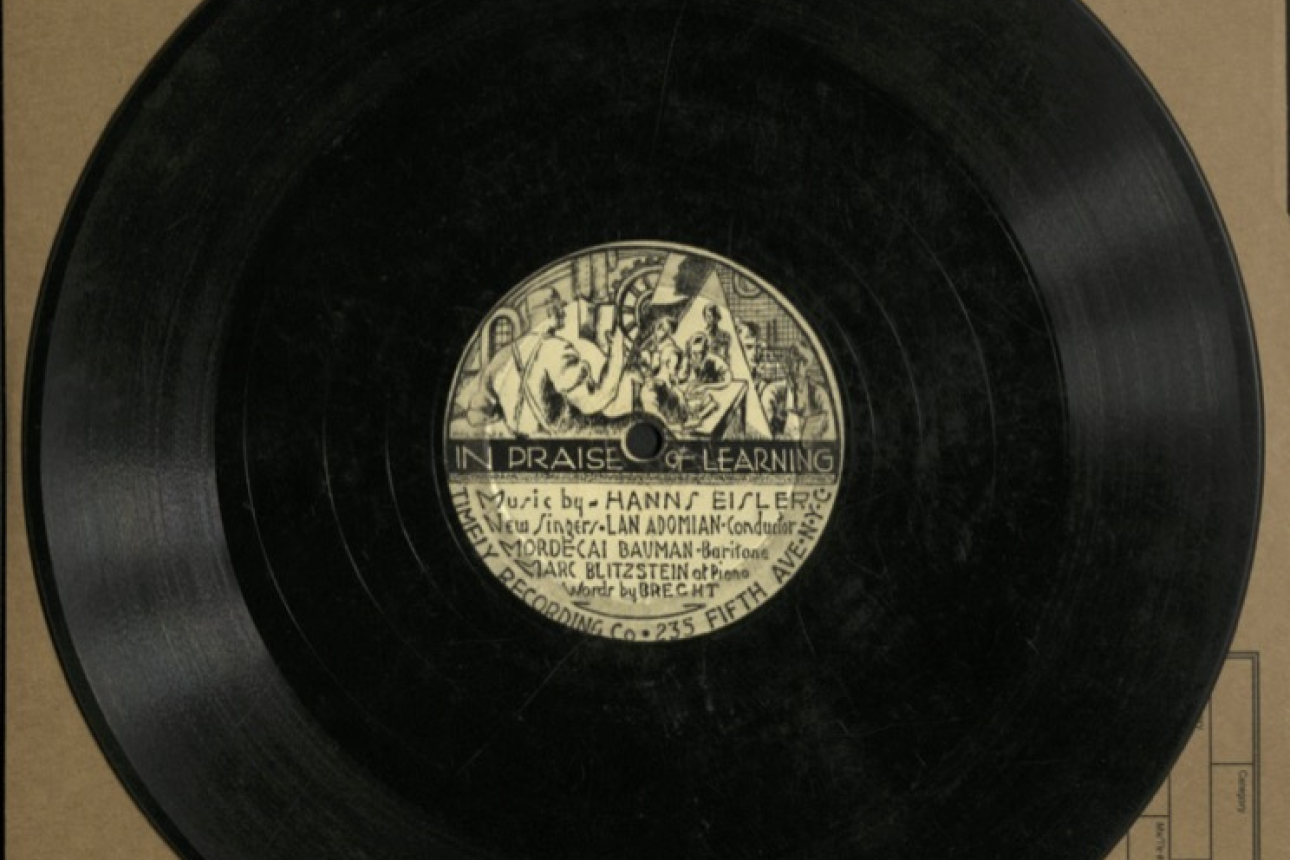78rpm disc with an illustrated label showing factory workers.