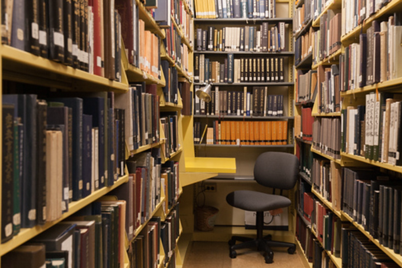 A carrel, or individual study desk, is seen in the stacks at Yenching Library