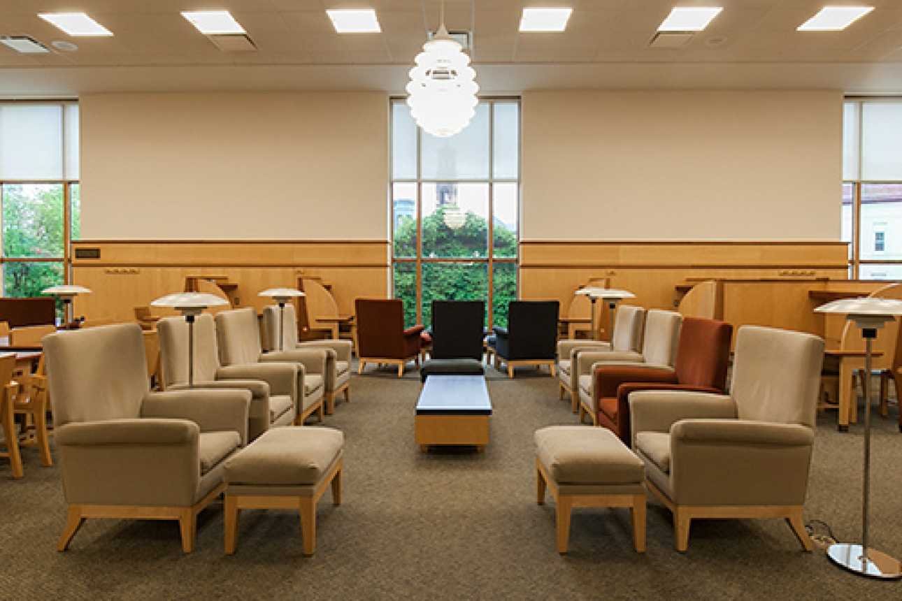 Soft seating and desks in a light filled study space