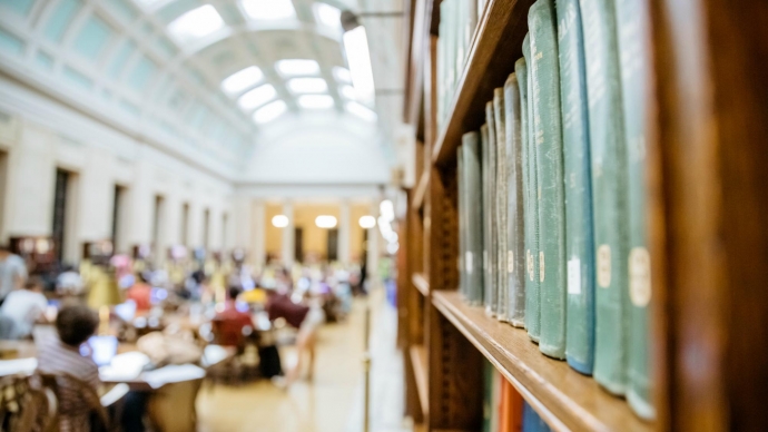 Books are seen in the Loker Reading Room in the Widener Library. 