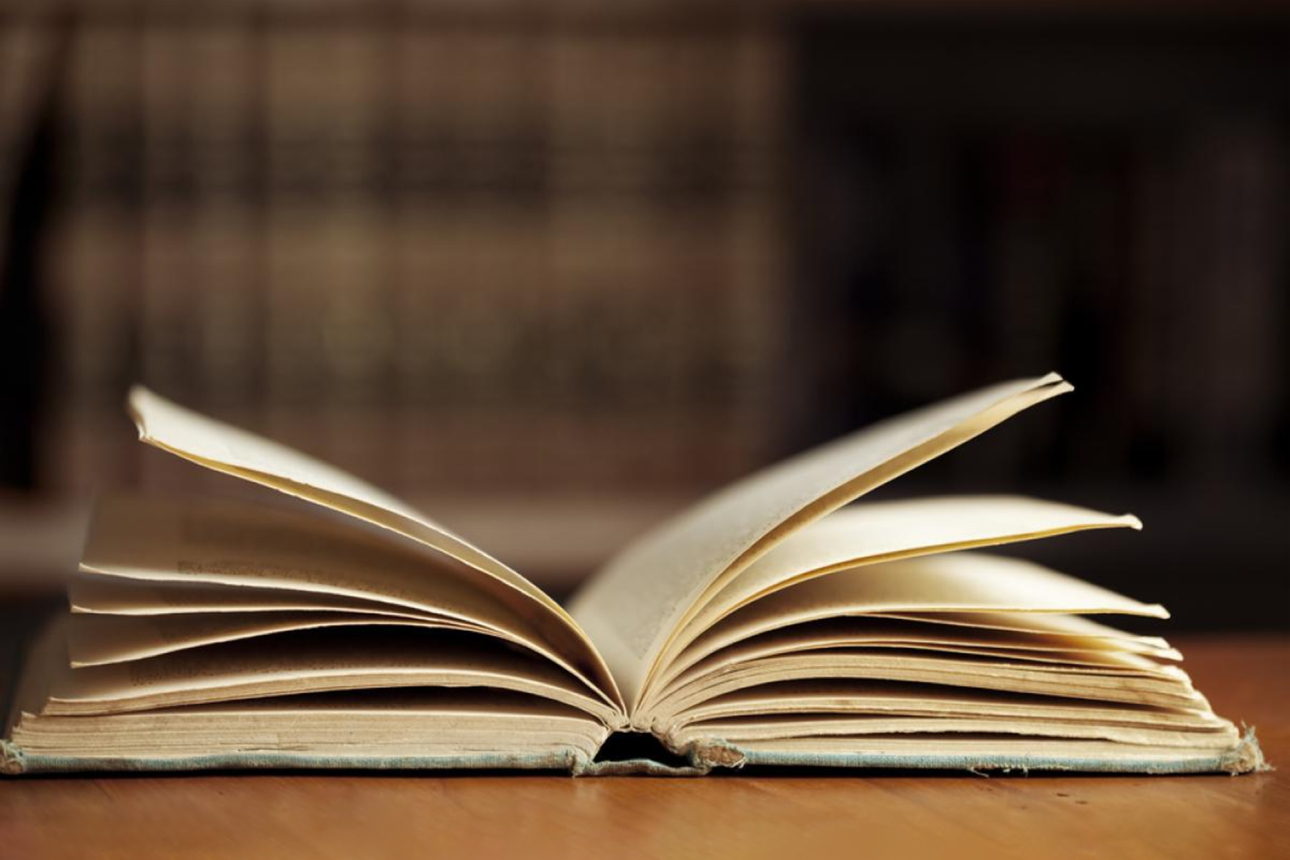 An open book lying on a table