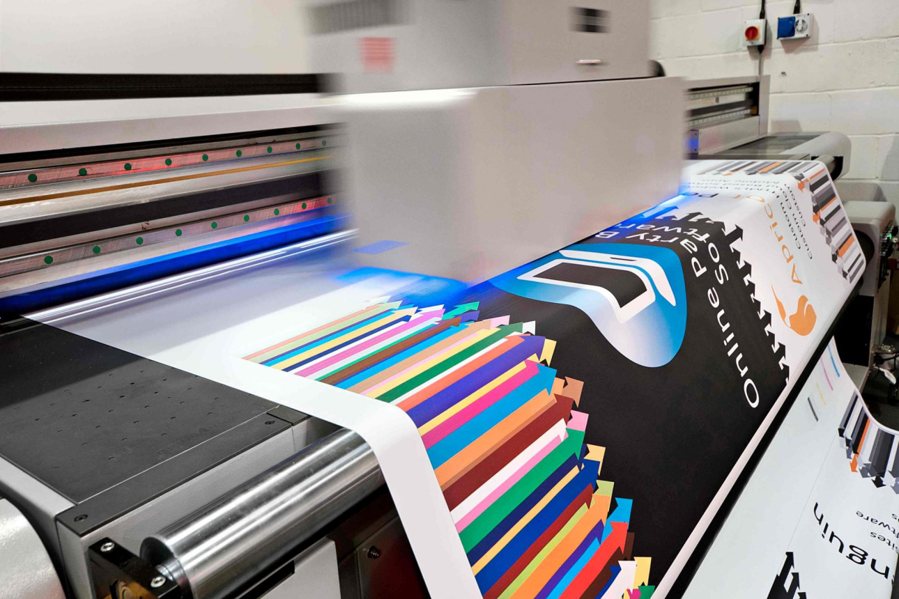 A large format printing works to print a poster.