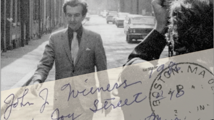 Poet in suit and tie from the 1950s walking down a cobblestone street