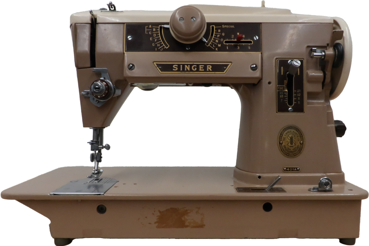 Vintage beige Singer sewing machine.