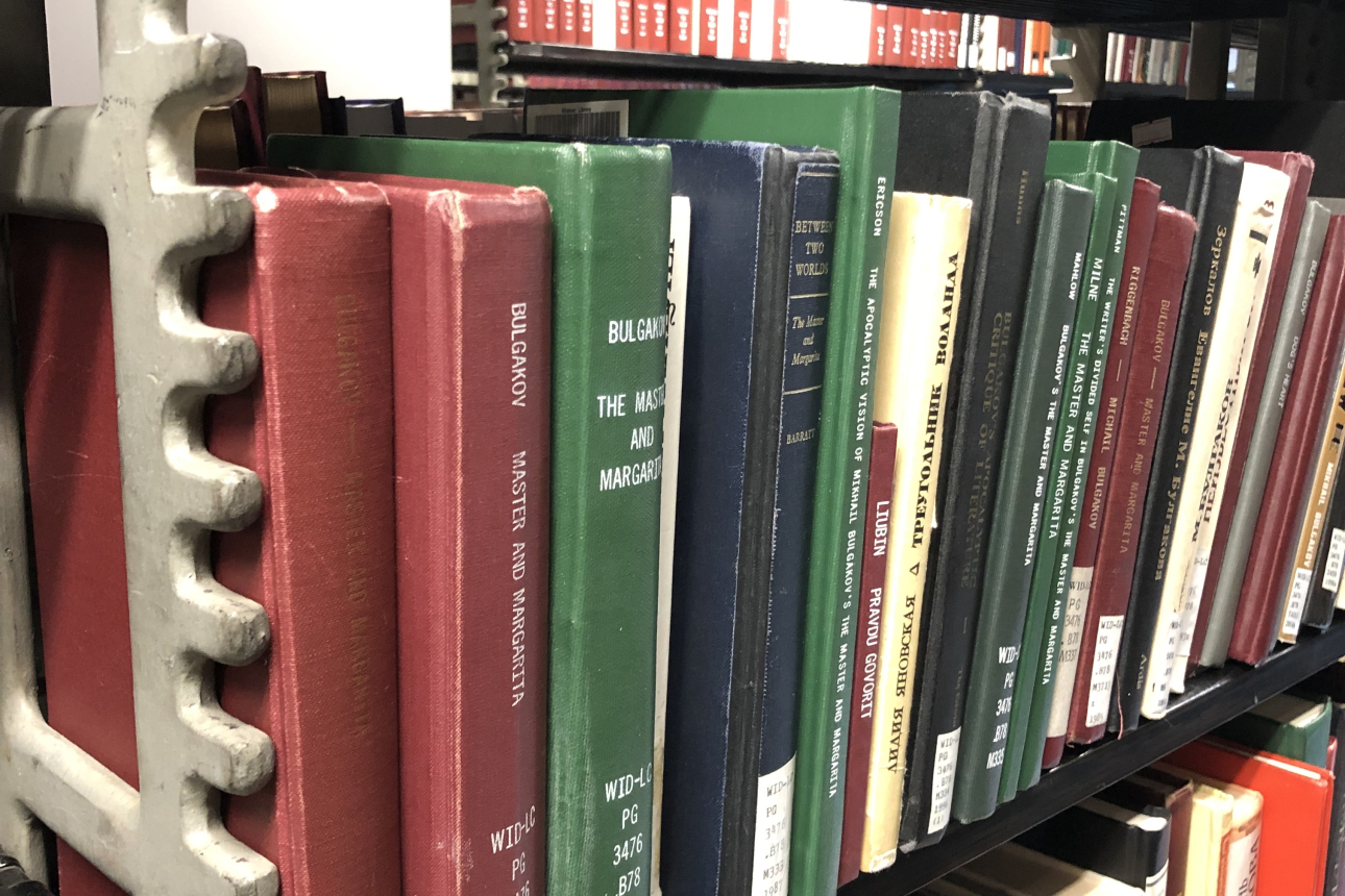 books on a shelf in widener stacks
