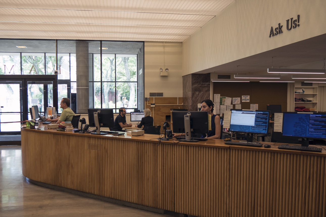 The circulation desk at Lamont Library