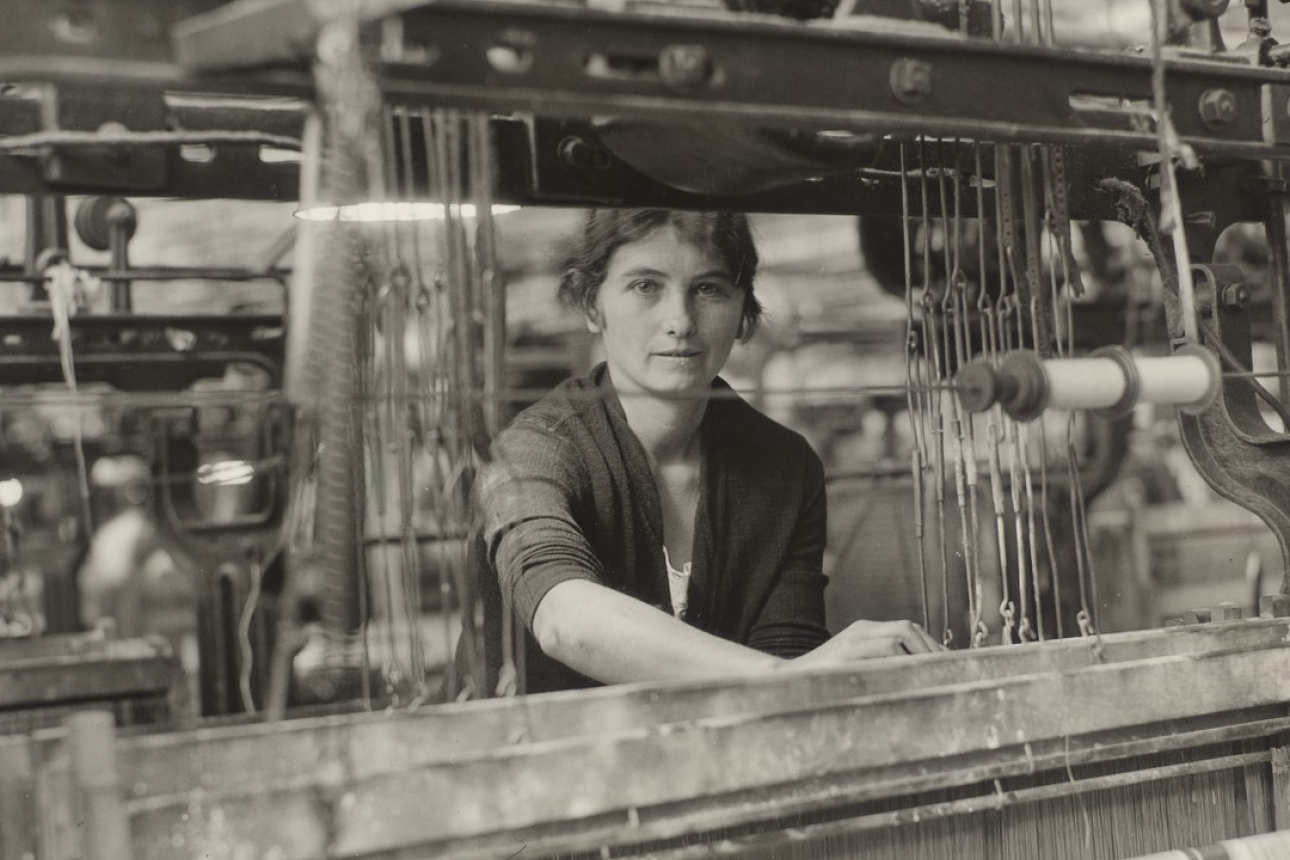 Woman at spinning machine, 1933.