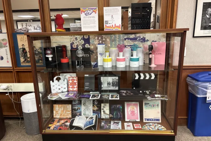 A case displaying k-pop fandom materials at Harvard-Yenching Library