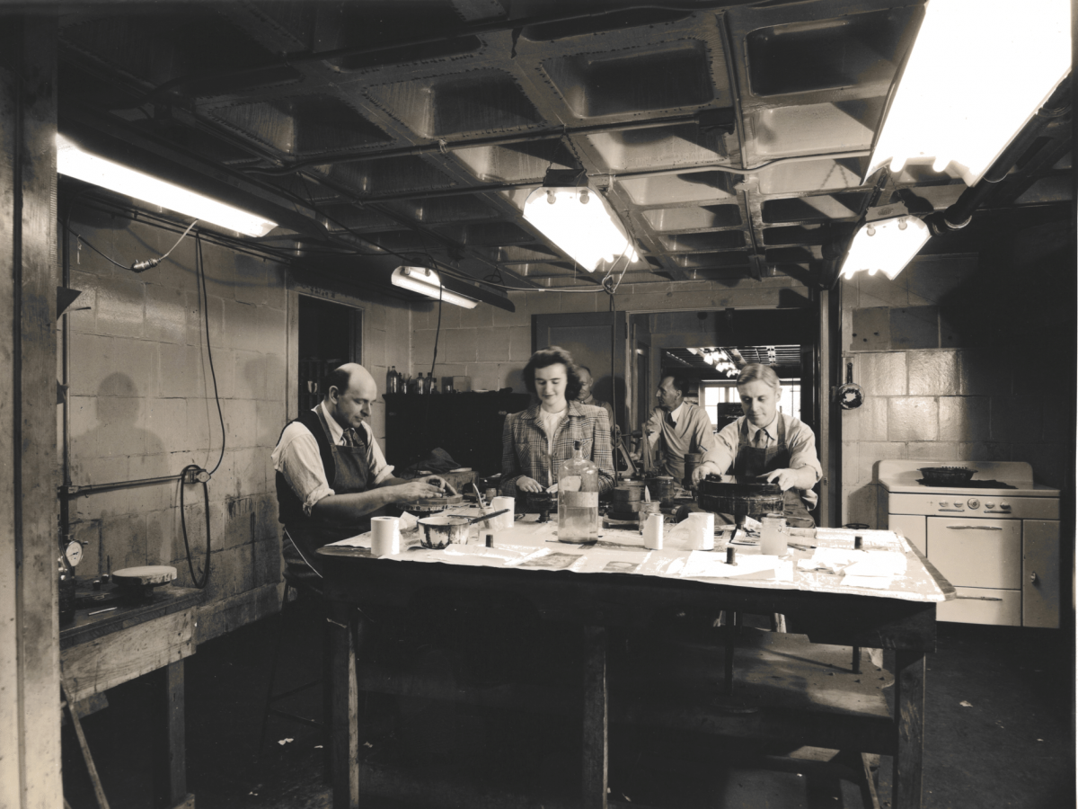 People stationed around a table
