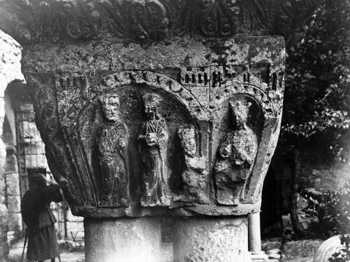 Photo of architectural detail depicting people