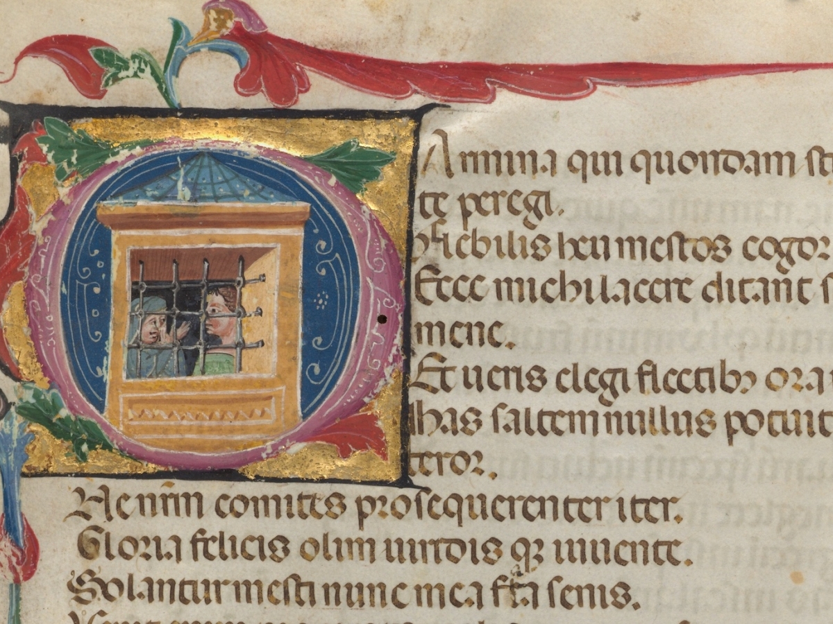 Decorative manuscript initial shows two people behind a barred prison window 
