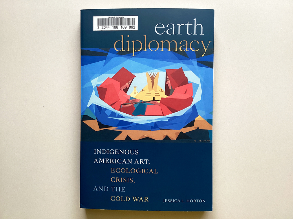 Book cover featuring illustration of two indigenous peole facing each other with the title, earth diplomacy