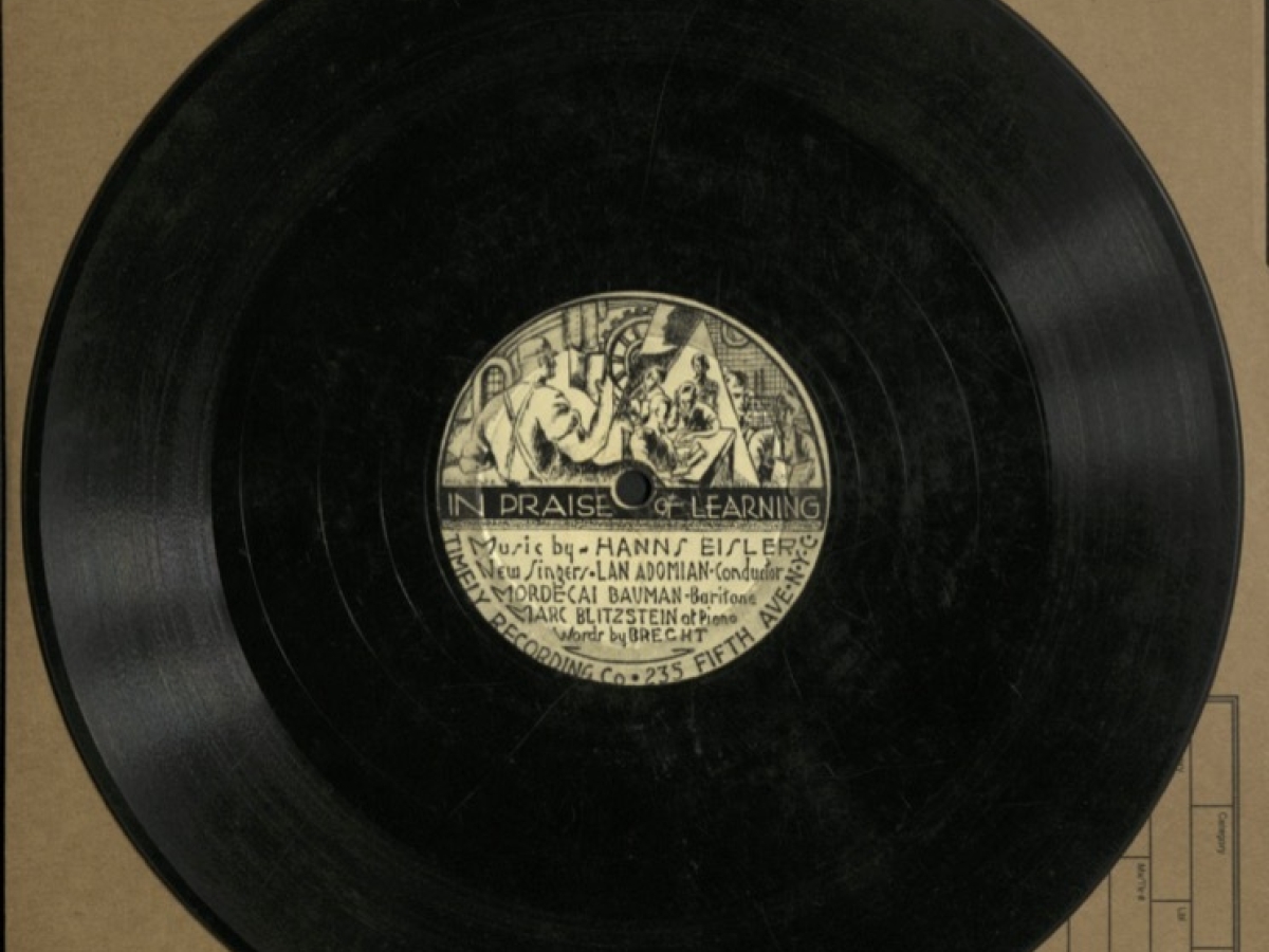 78rpm disc with an illustrated label showing factory workers.