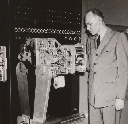 Howard H. Aiken, associate professor of applied mathematics, with automatic calculator, circa 1945.