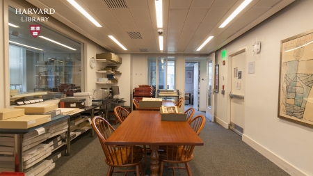 Photograph of a small room with chairs and a table
