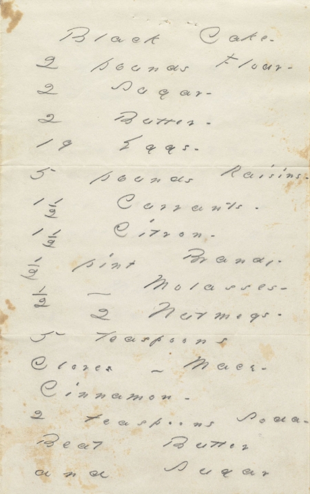 Manuscript recipe for Emily Dickinson’s black cake written in pencil on cream-colored and lightly stained paper.