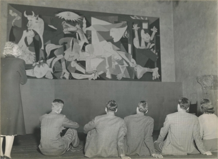 Seated students with Pablo Picasso's "Guernica," Warburg Hall, Fogg Museum, 1941.