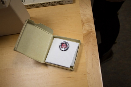 A pin button from the Occupy Harvard protests.