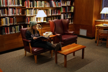 Student reading in Farnsworth room