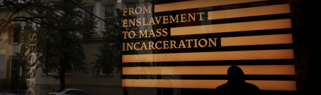 Picture of wall art saying From Enslavement to Mass Encarceration