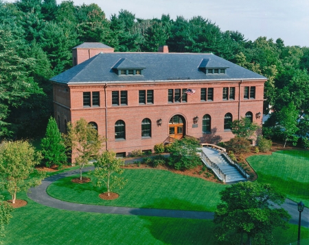 Brick building surrounded by trees