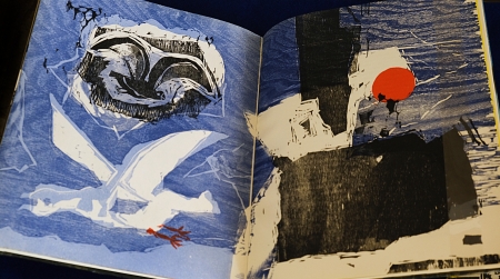 Page spread of woodblock illustrations. Left page shows two sea birds against the blue background. Right page shows blocks of black shapes against mostly blue background with a red circle above.