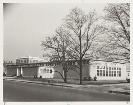 Exterior of Cowie Hall, low-slung brick building