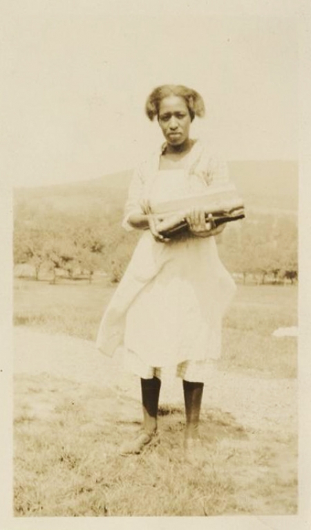 Portrait of unidentified woman, likely Saxon, standing outdoors.