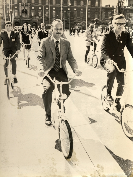 Maurice Strong, Jan Mårtenson, and Swedish Information Center staff use the bikeshare of the 1972 UN Conference on the Human Environment in Stockholm.