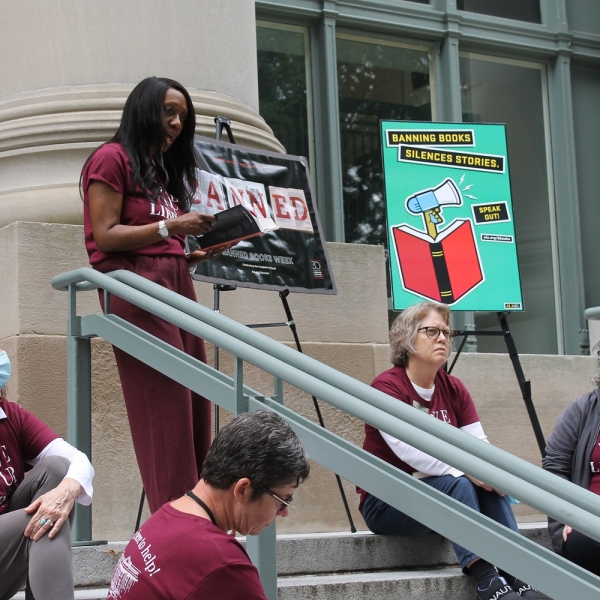 Harvard Law School librarians and staff members read from their favorite banned books on the steps of the Harvard Law School library. 