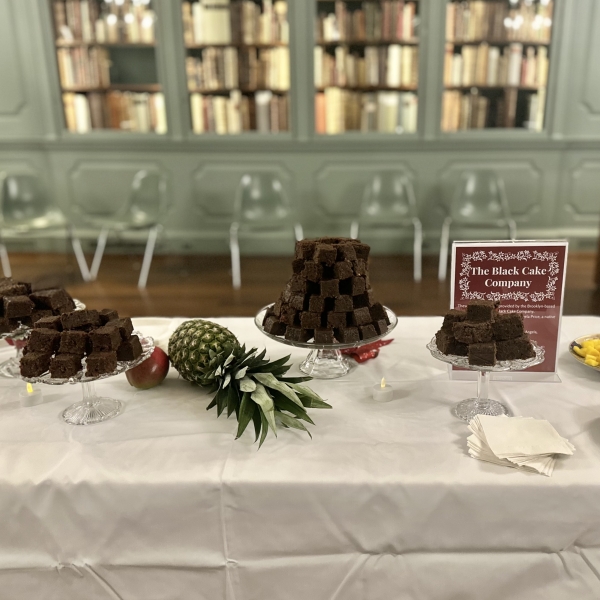 Black cake on a table at Houghton Library