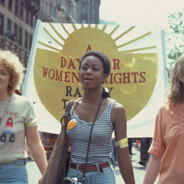 three women at a protest