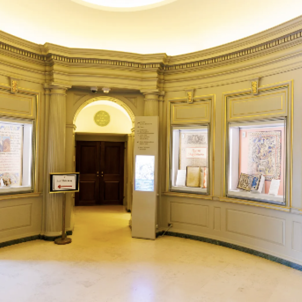 A view of Houghton Library's lobby gallery space with exhibit items.