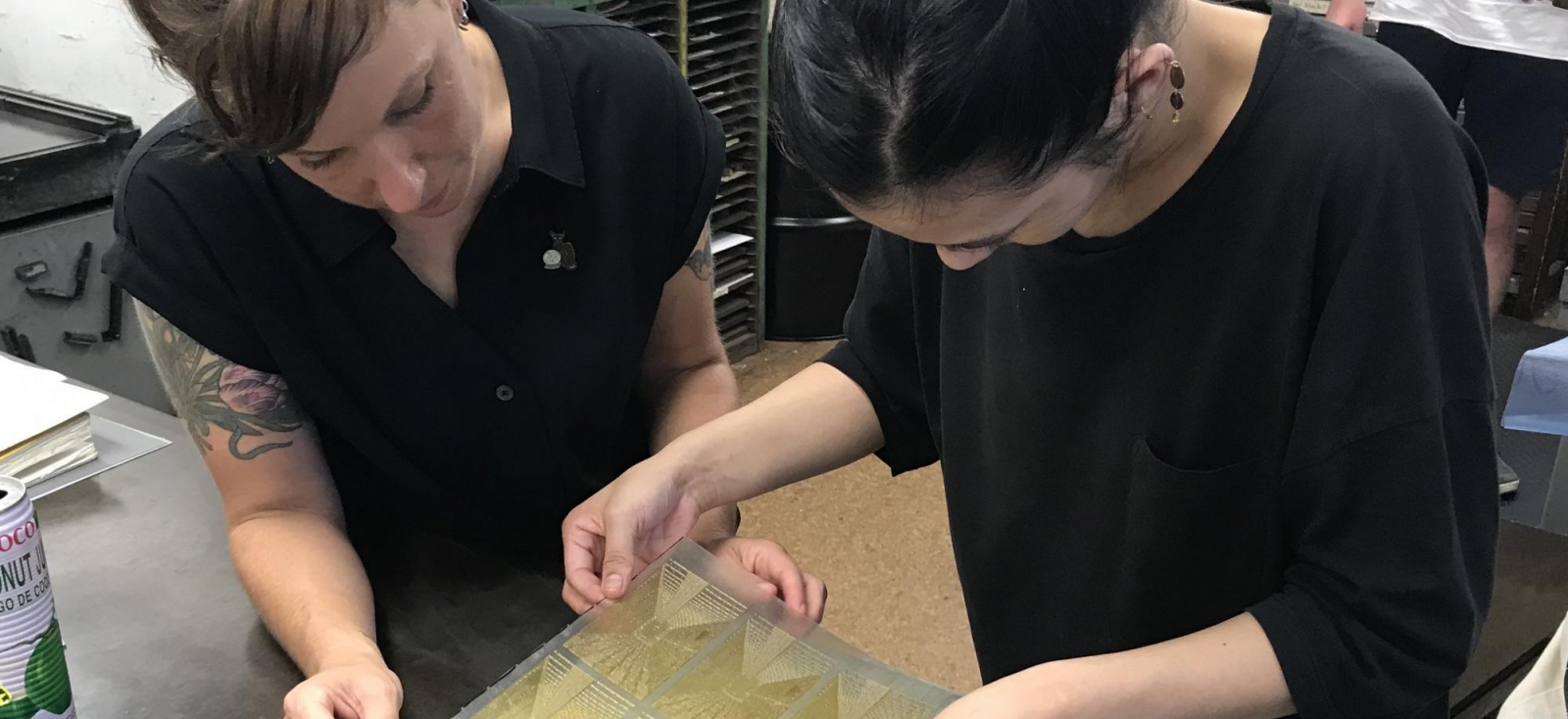 Emilie Hardman and Nicole Araya work on her research project 