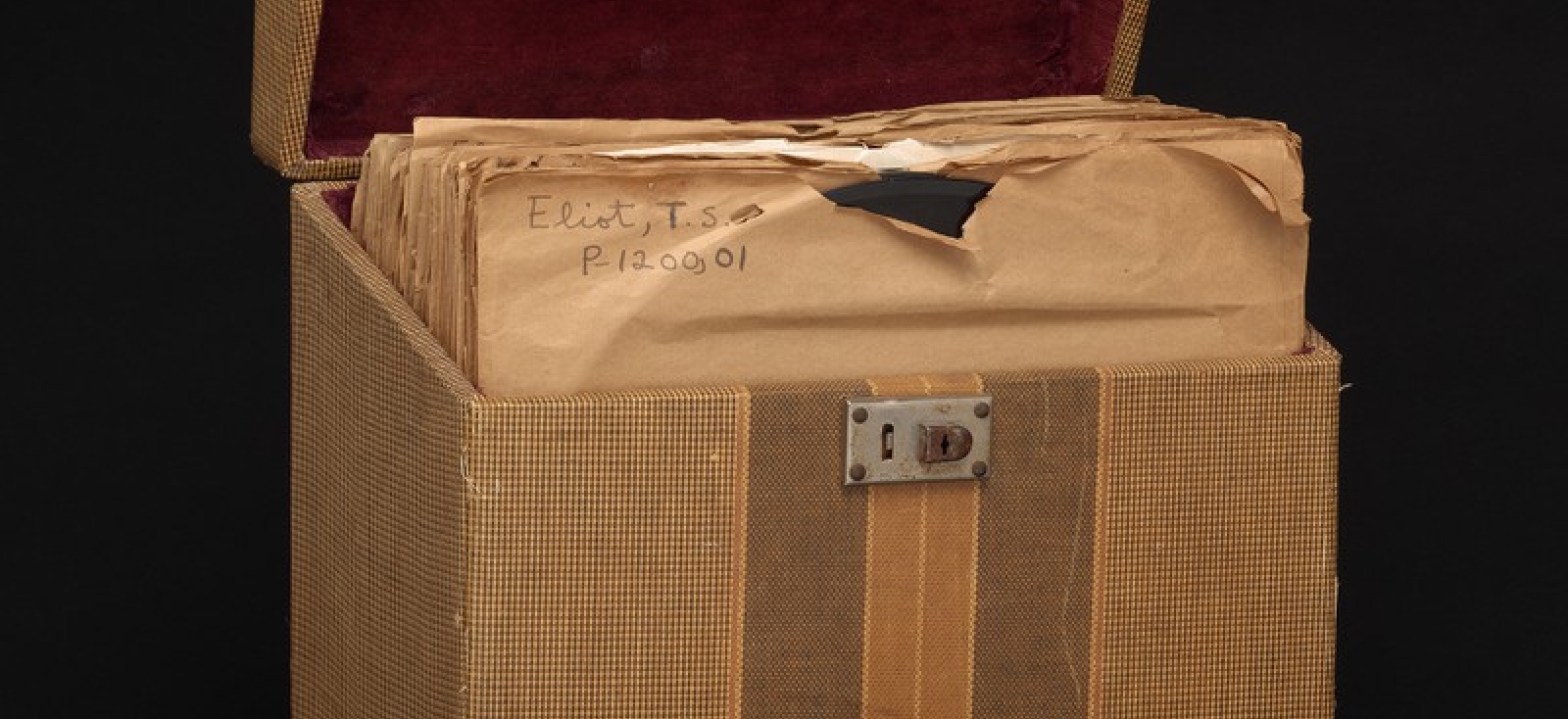 Photograph of a brown case full of record albums