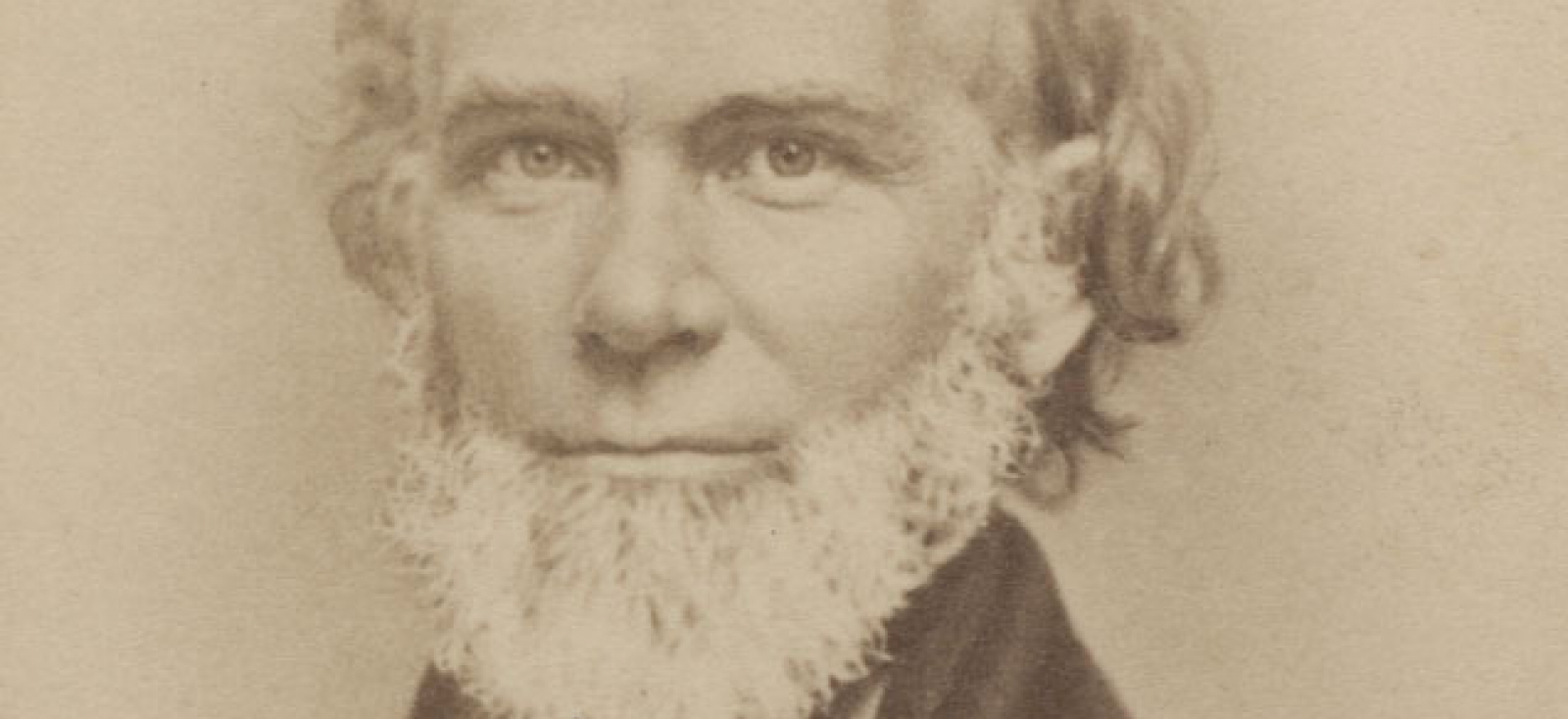 portrait of Theodore Parker looking expressionless at the camera and wearing a suit