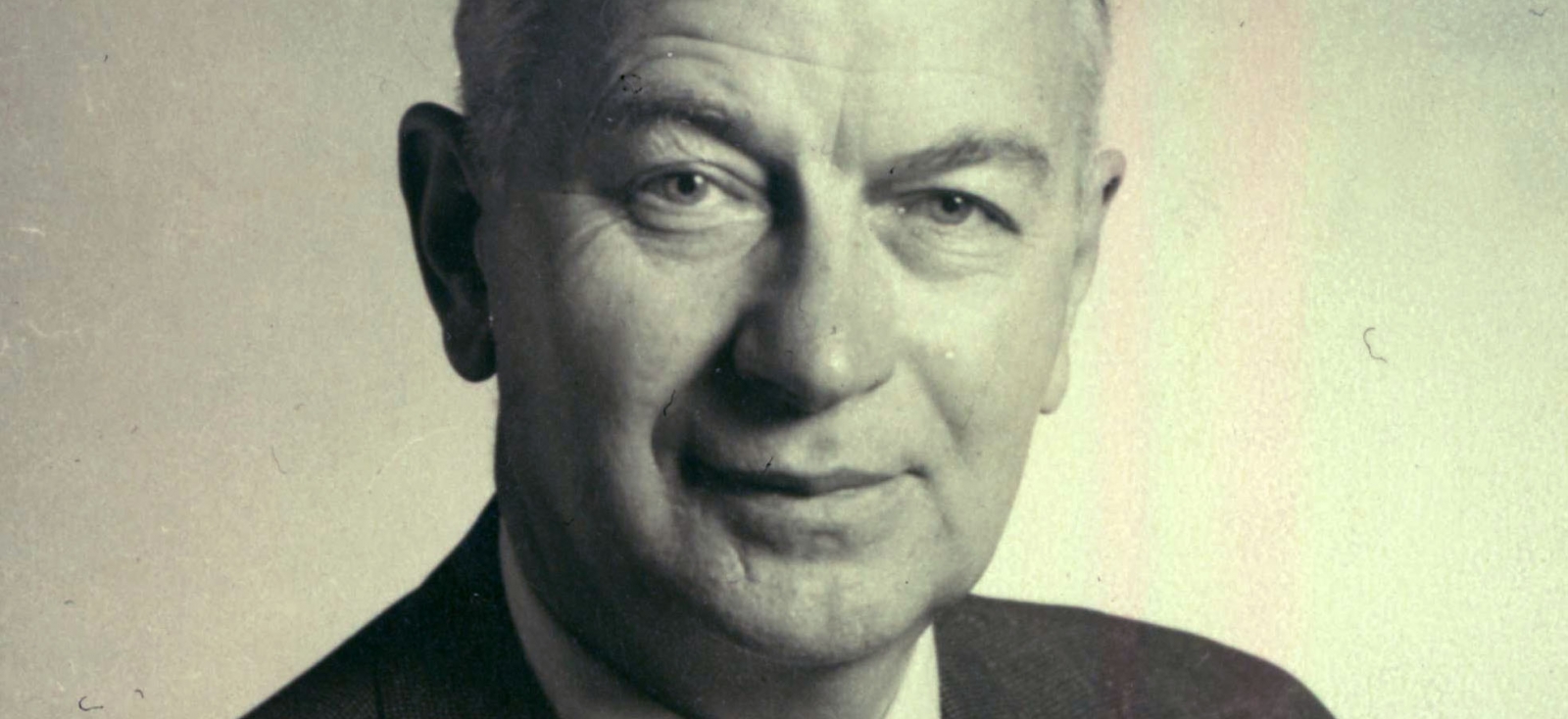 Alexander V. Chukayeff smiles at the camera