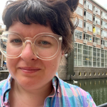 portrait of Rose Reynolds in front of building
