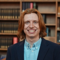 David Donnan in library in blazer